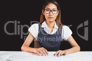 Serious businesswoman using a computer