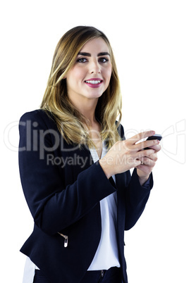 Smiling woman using smartphone