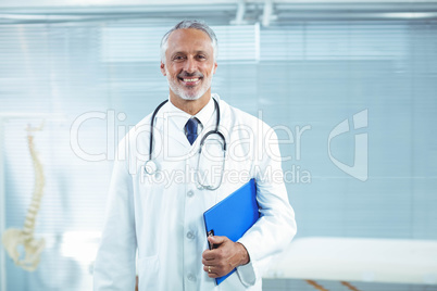 Doctor standing in clinic