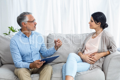 Therapist consoling a woman