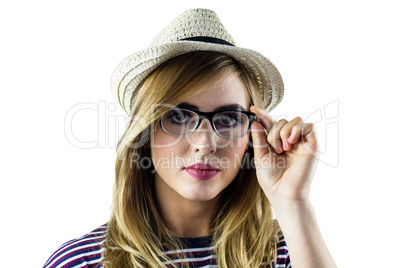 Woman touching her glasses