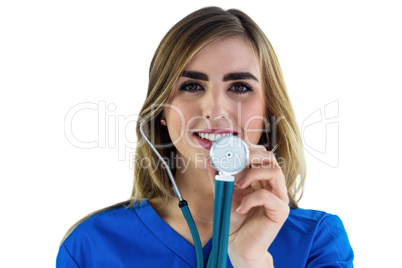 Smiling nurse usin