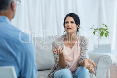 Therapist consoling a woman