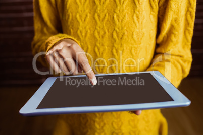 Focused asian woman using tablet