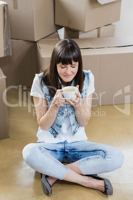 Young woman having coffee