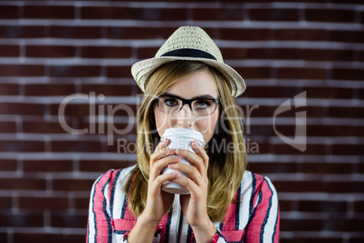 Woman drinking a beverage