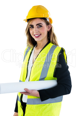 Smiling woman holding construction plan