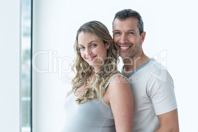 Couple looking at camera and smiling