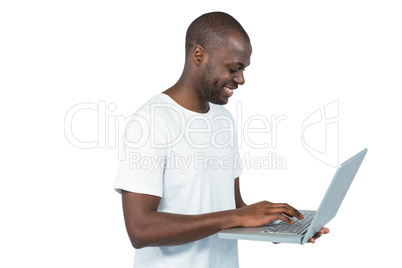 Happy man using laptop