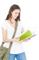 Happy female college student studying