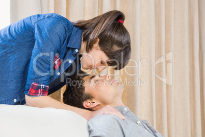 Couple at home relaxing on the sofa