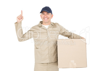 Delivery man carrying a package and pointing