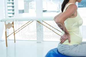 Pregnant woman doing exercise