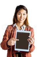 Smiling businesswoman pointing a tablet