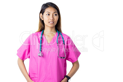 Asian nurse with stethoscope looking at the camera