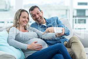 Couple taking a selfie on smartphone