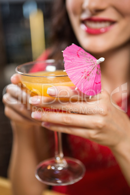 Pretty woman having a cocktail