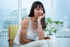 Pregnant woman sitting  depressed
