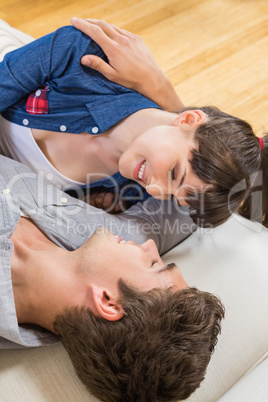 Couple at home relaxing on the sofa