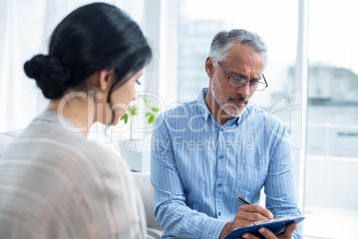 Therapist consoling a woman