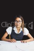 Serious businesswoman using a computer