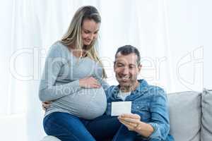 Couple looking at ultrasound scan
