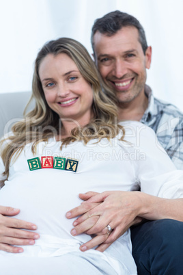 Pregnant woman with baby cubes