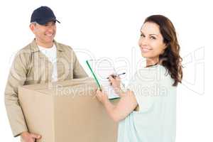 Happy delivery man giving package to customer