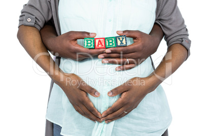 Pregnant woman with baby cubes