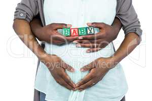 Pregnant woman with baby cubes