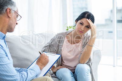 Therapist consoling a woman