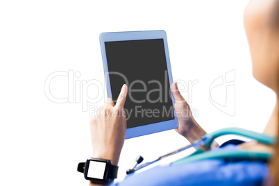 Asian nurse using tablet