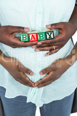 Pregnant woman with baby cubes