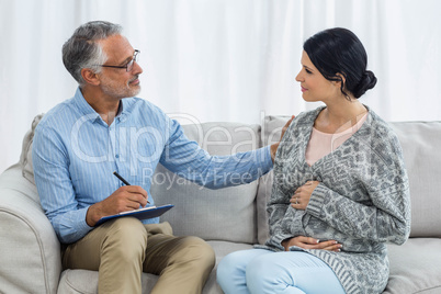 Therapist consoling a woman