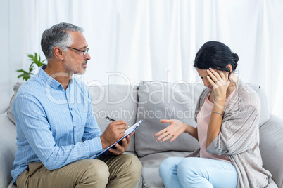 Therapist consoling a woman