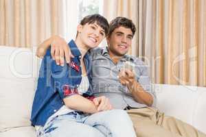 Couple at home relaxing on the sofa