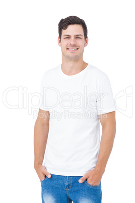 Handsome man posing with hands on pocket