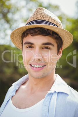 Close-up of young man standing in garden