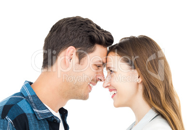 Couple standing head against head