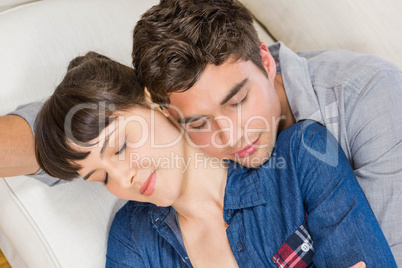 Couple at home relaxing on the sofa Couple at home relaxing on the sofa