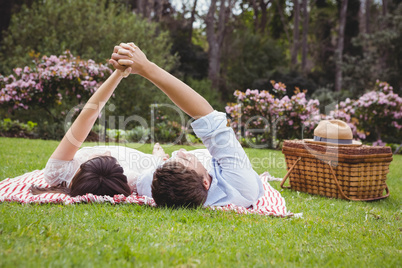 Young couple relaxing on blanket