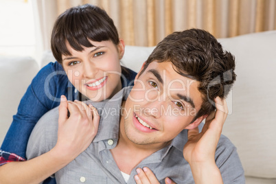 Portrait of beautiful young couple relaxing