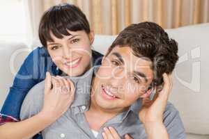 Portrait of beautiful young couple relaxing