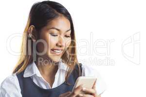 Smiling businesswoman using a smartphone