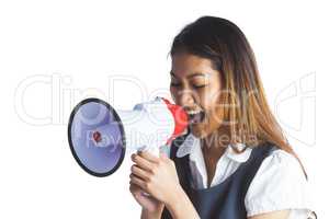 Businesswoman shooting through a megaphone