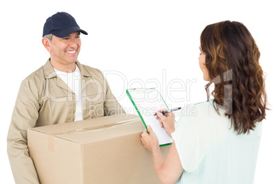 Happy delivery man giving package to customer