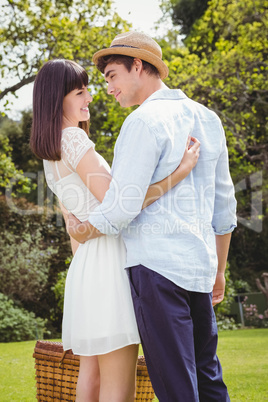 Young couple embracing outdoors