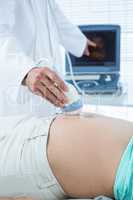Pregnant woman undergoing ultrasound test
