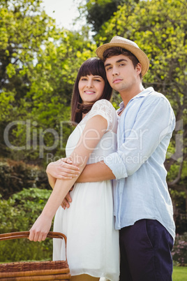 Young couple embracing outdoors