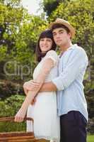 Young couple embracing outdoors